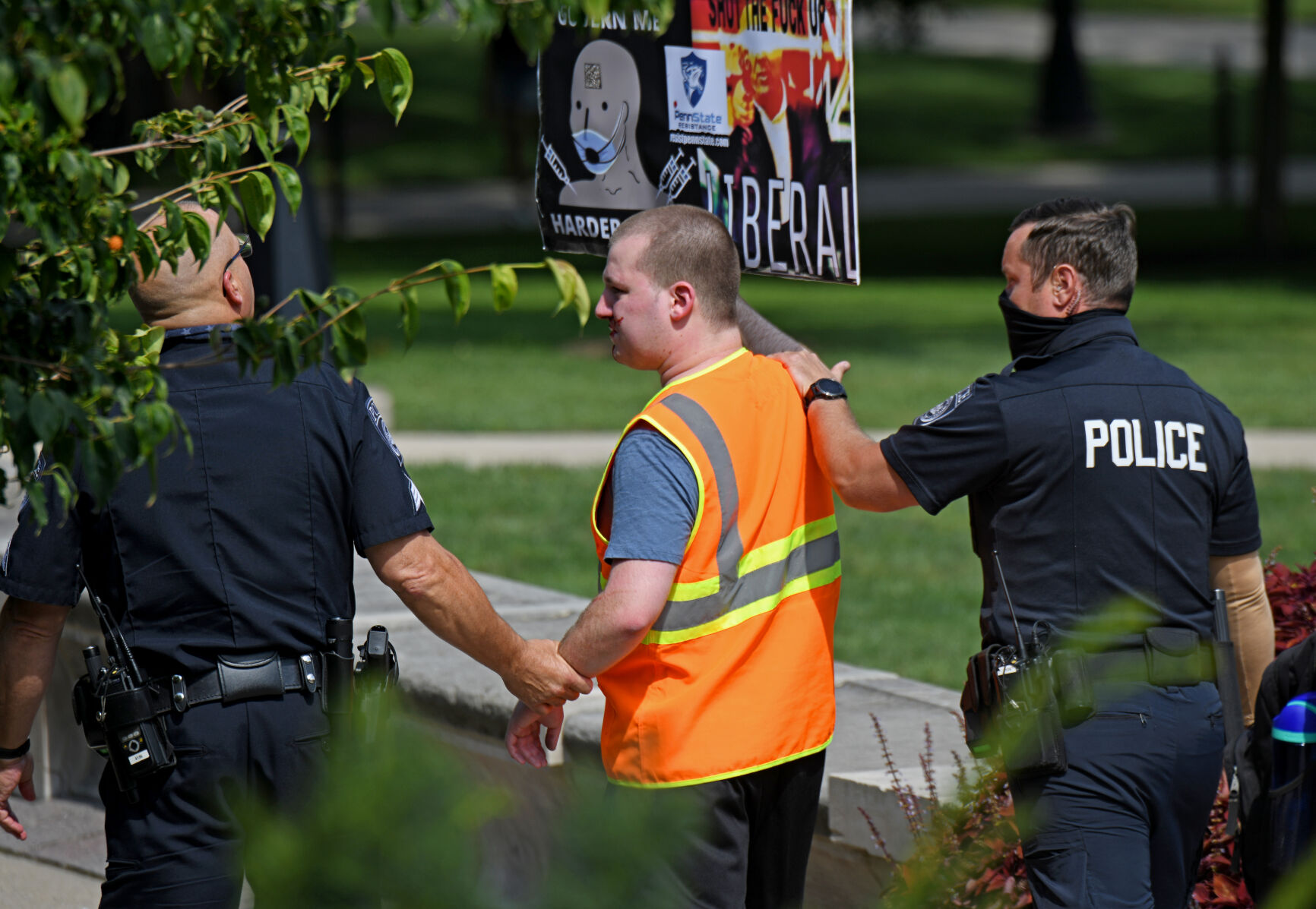 Rally to Vaccinate Penn State, campus police escort counter protester